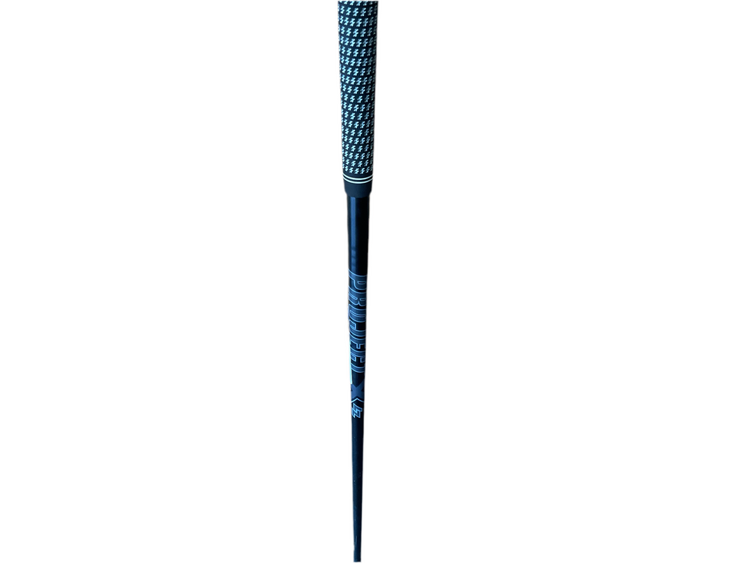 Black and blue golf club grip with textured pattern, likely made of rubber or synthetic material.