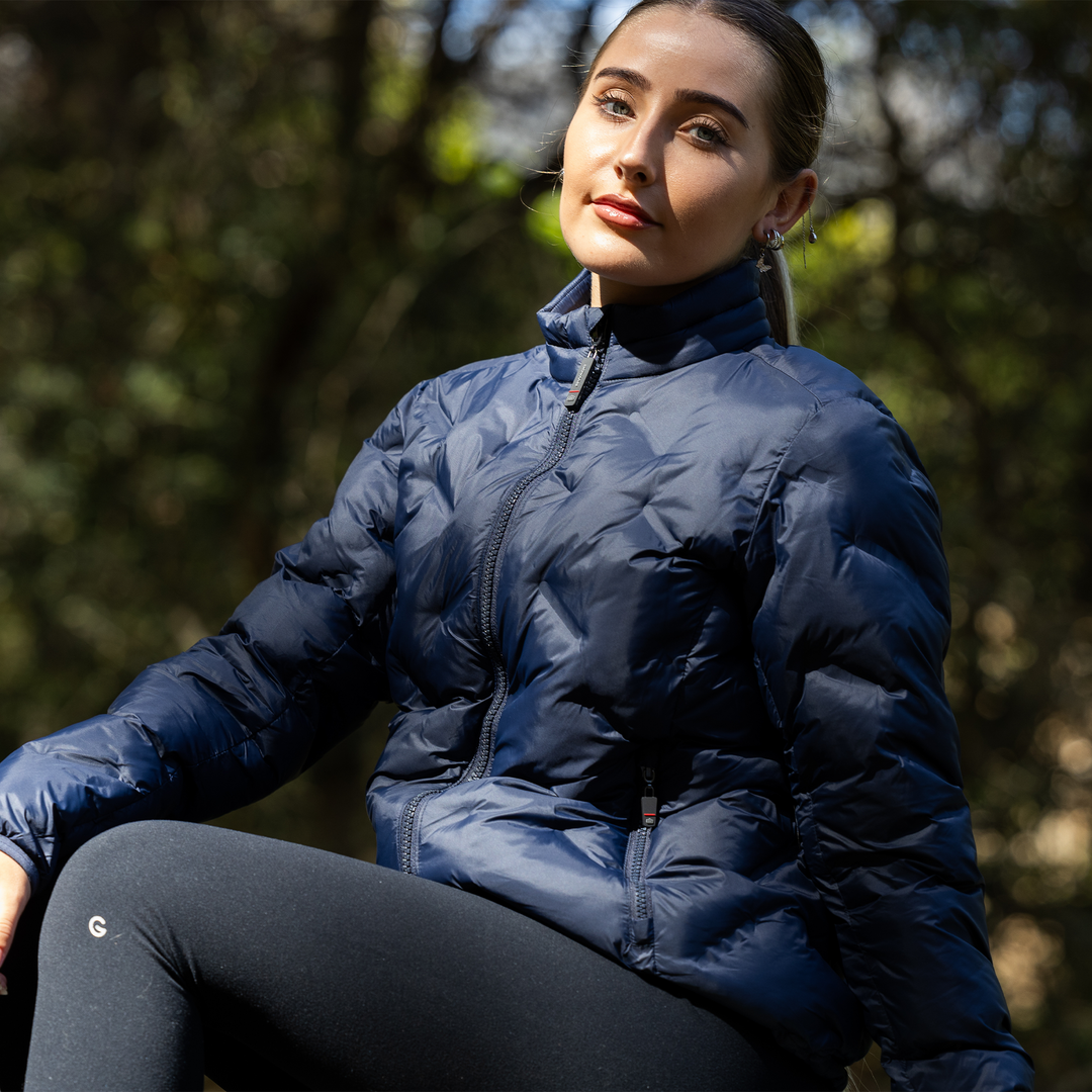 Swagg Womens Quantum Puffer Jacket in navy blue quilted design