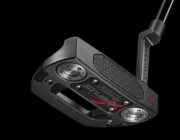 Black scotty cameron putter with silver accents and a sleek design.