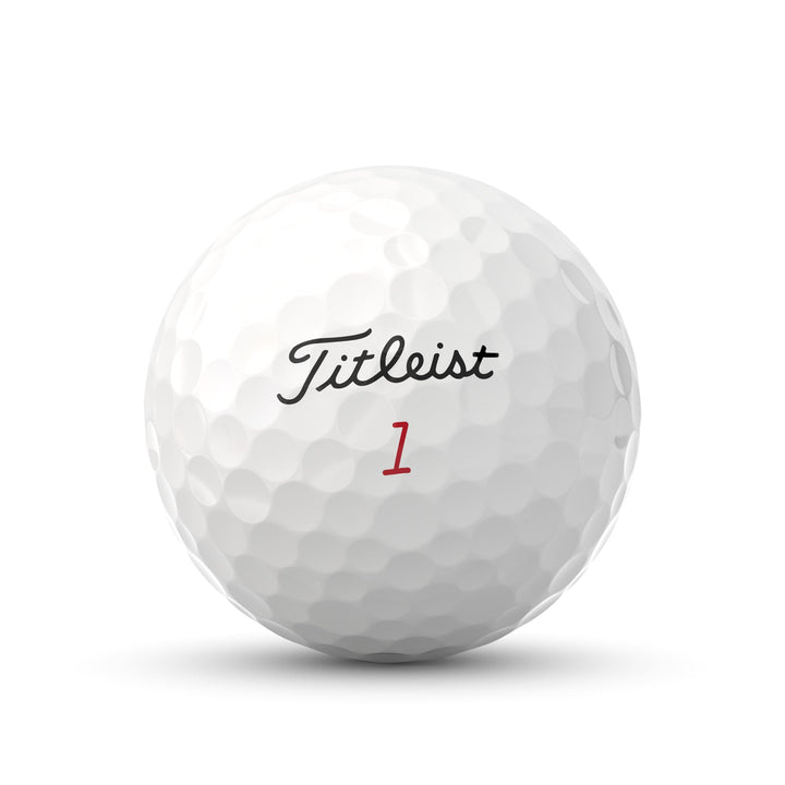 White titleist golf ball with dimpled surface and red number 1