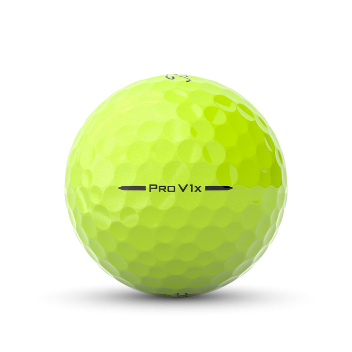 Yellow golf ball with dimpled surface, pro v1x model by titleist.