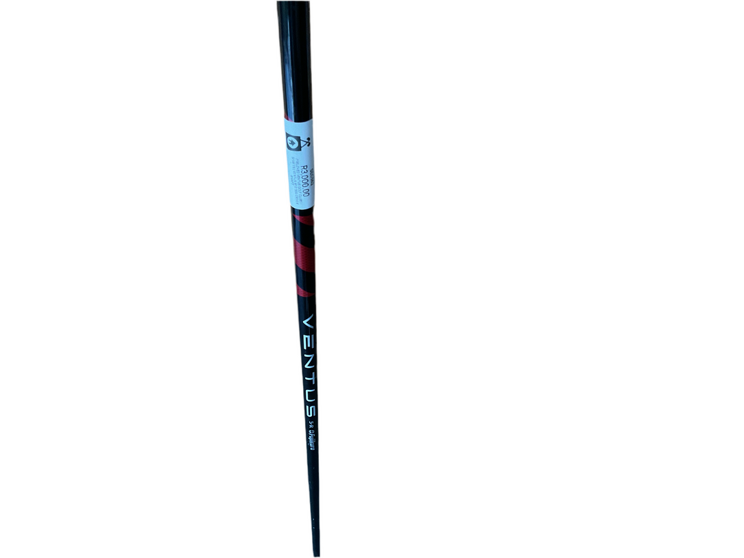 Black and red golf club shaft with ’ventus’ branding.