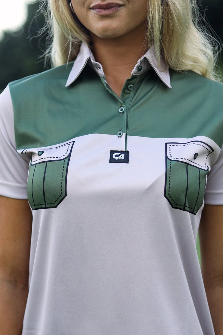 White and green polo shirt with contrast stitching, logo on chest.