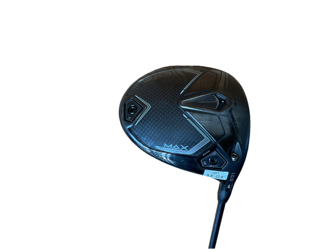 Black and silver driver golf club head with a sleek design, featuring the ’max’ logo.