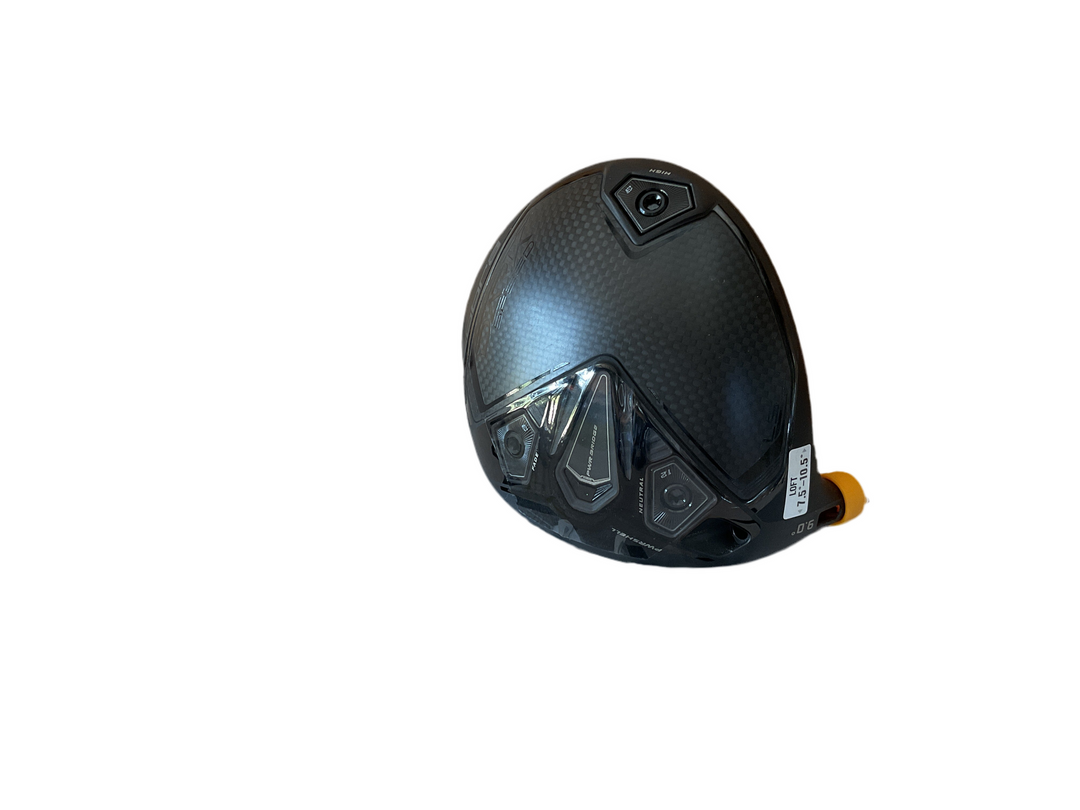 Black motorcycle helmet with clear visor and yellow tag