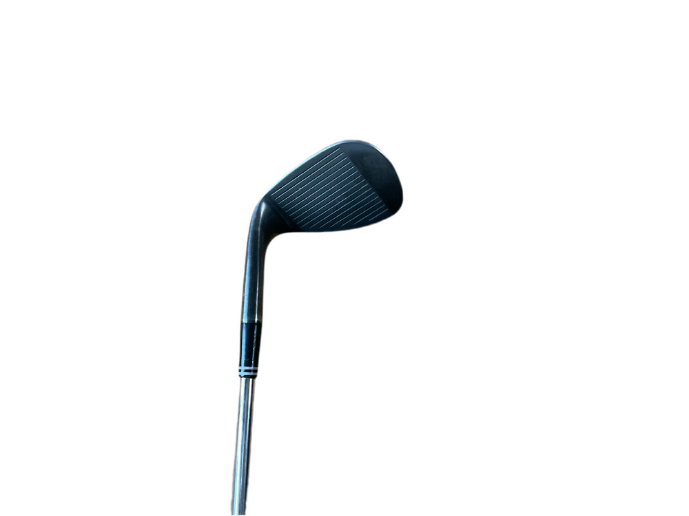 Black wedge golf club head with textured grip and metal shaft.