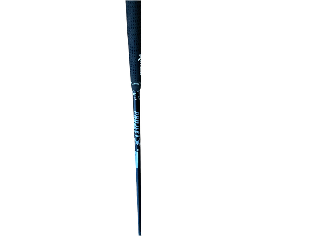 Black and white golf club shaft with ’rpm’ branding.