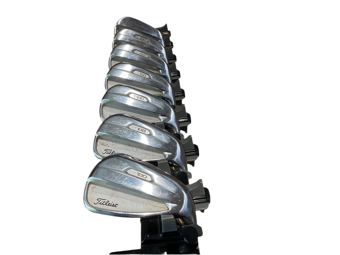 Silver titleist golf iron set with black accents and sleek design.
