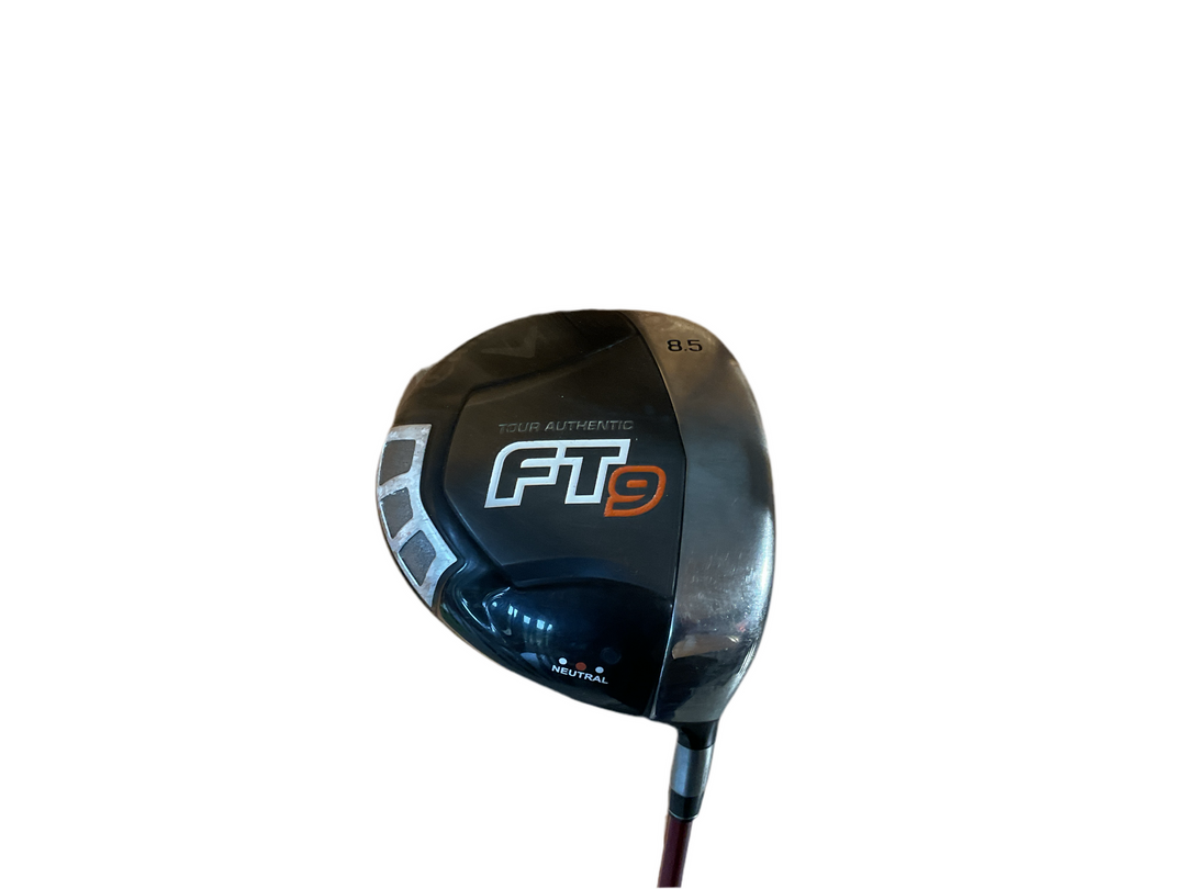 Ft9 golf driver with black and silver accents, featuring a sleek design.