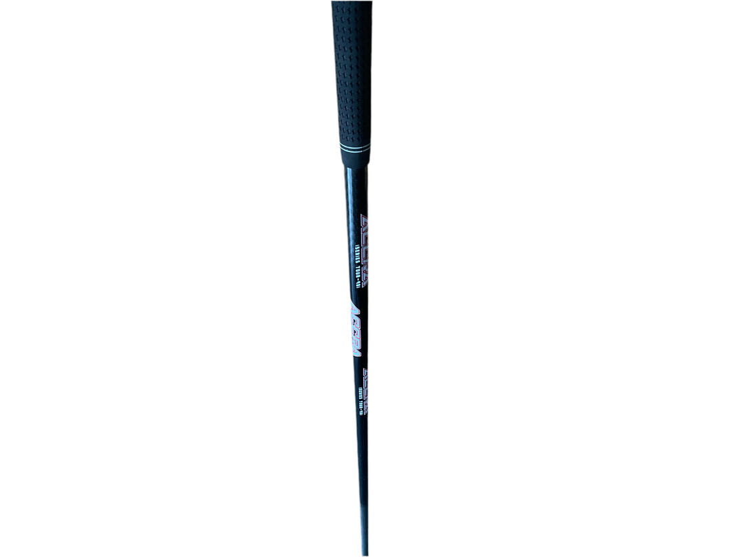 Black and silver golf club grip with textured handle design, featuring a sleek modern look.