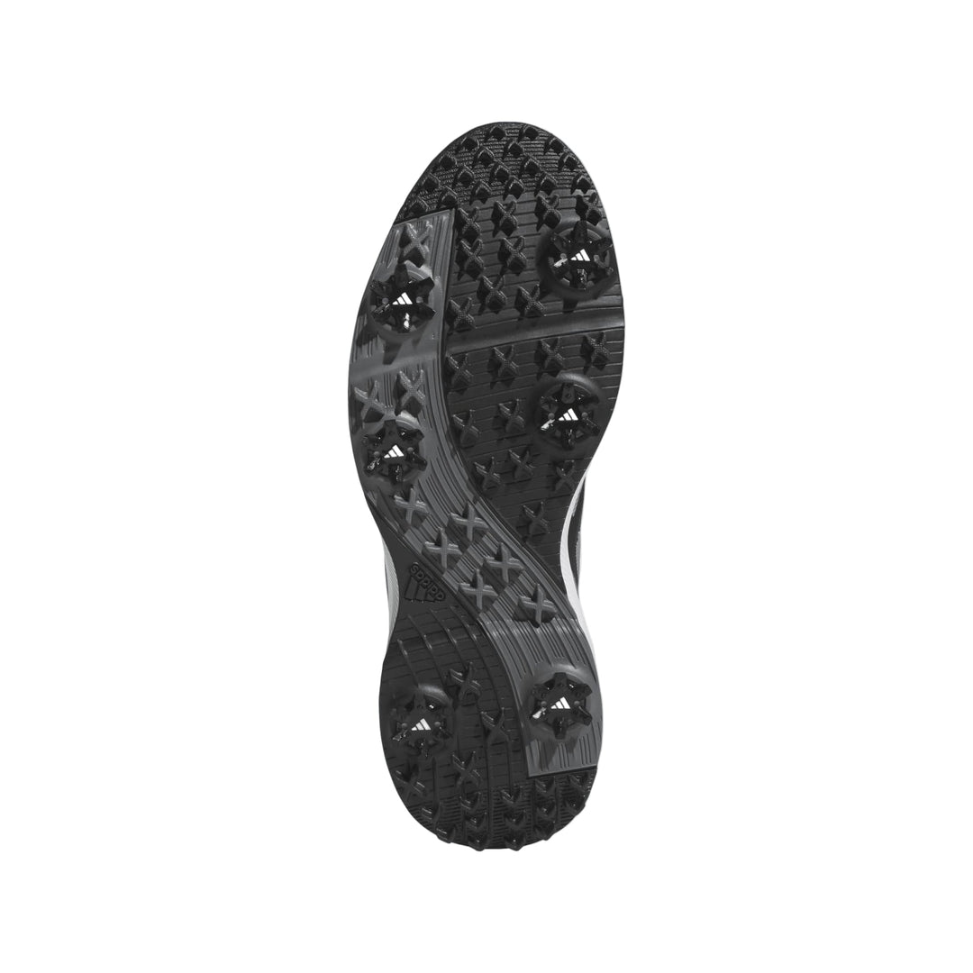 Black golf spike shoe with textured sole and adidas branding.