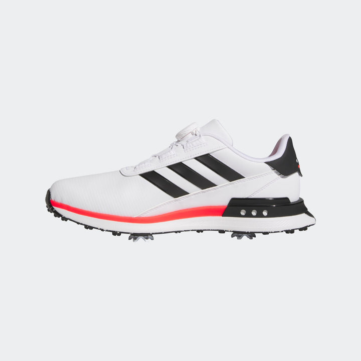 Adidas white and black golf shoe with red accents.