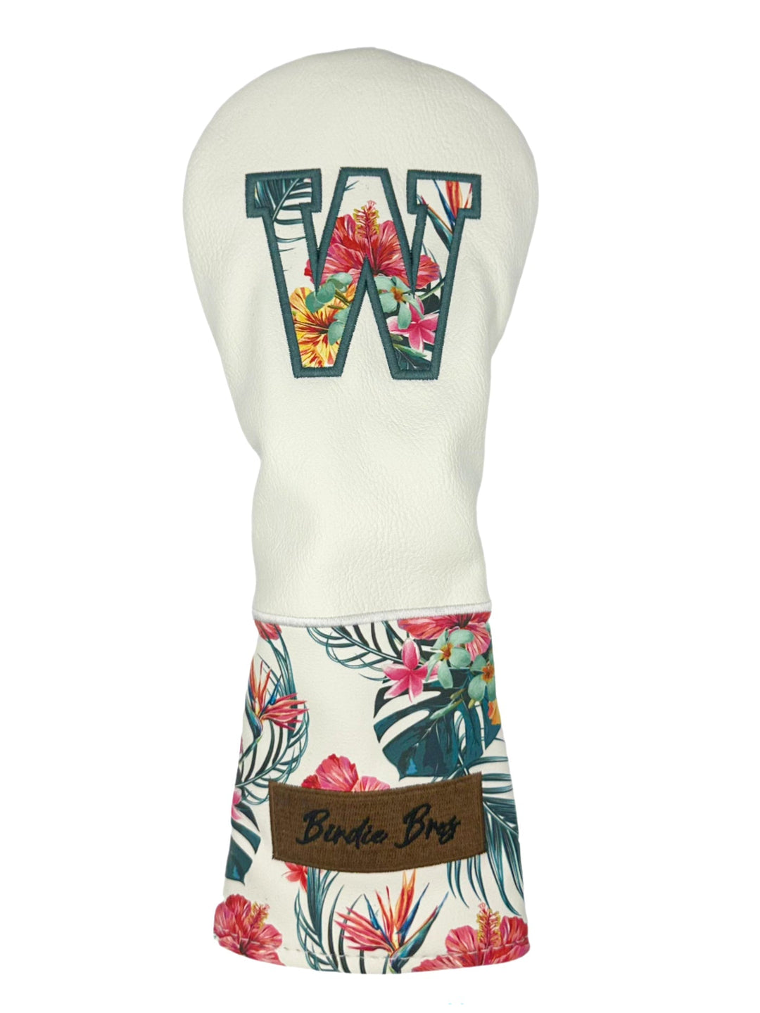 White floral golf club head cover with green letter ’w’ and brown label.