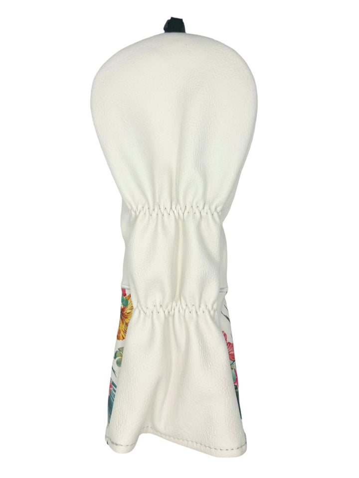 White floral golf club head cover with elastic drawstring closure.