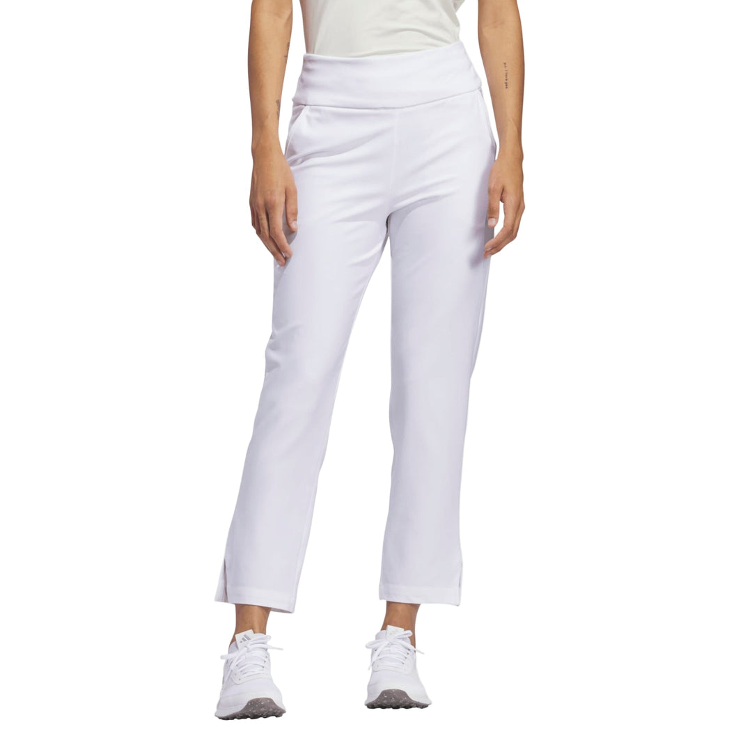 White cropped pants with a high waist and relaxed fit, likely made of stretchy fabric for comfort.