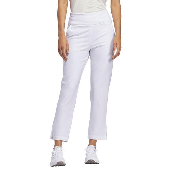 White cropped pants with a high waist and relaxed fit, likely made of stretchy fabric for comfort.
