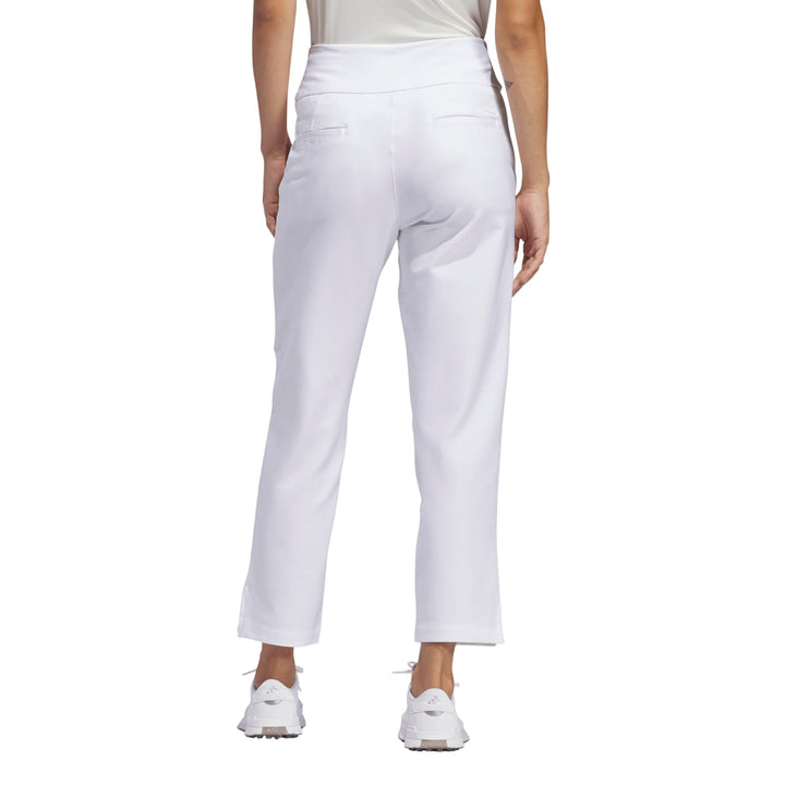 White golf pants with a high waist and straight leg design, likely made of synthetic fabric for durability.