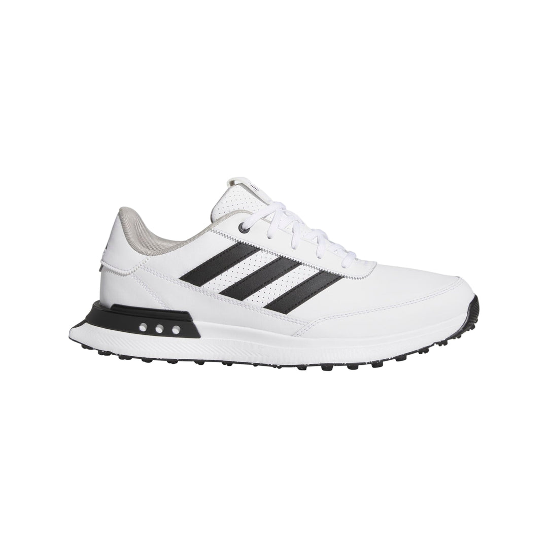 White and black adidas sneaker with textured sole design.
