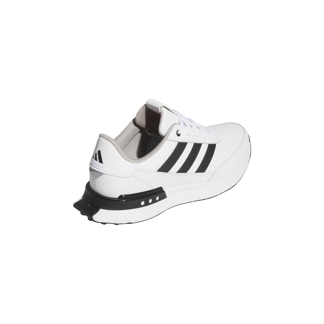 White and black adidas sneaker with three stripes on the side.