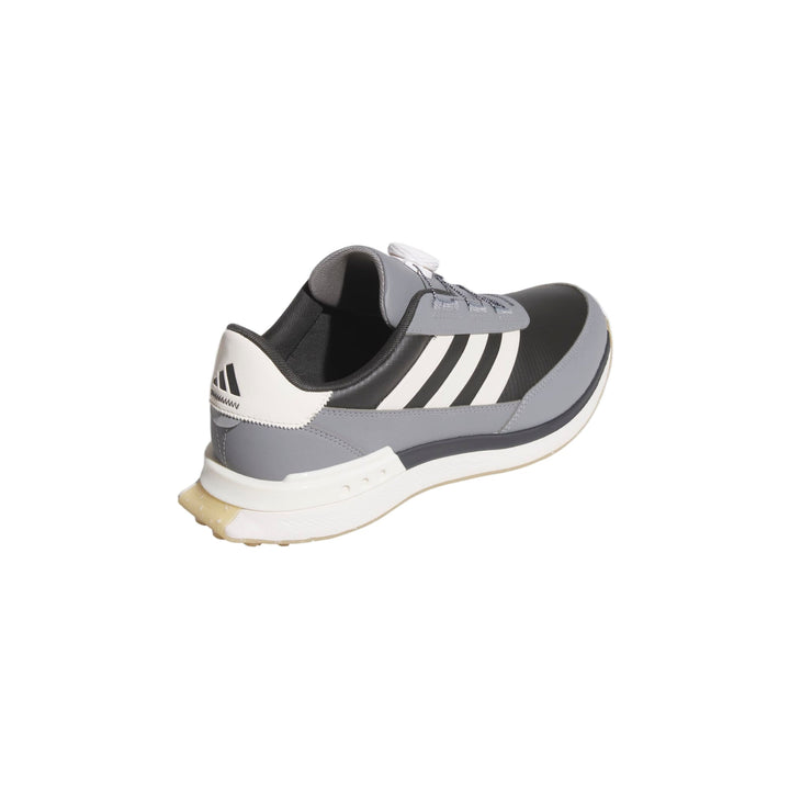 Adidas running shoe with white and black stripes, featuring a sleek design.