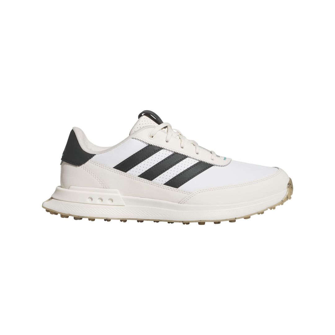 White and black adidas golf shoe with textured sole design.