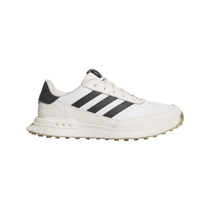 White and black adidas golf shoe with textured sole design.