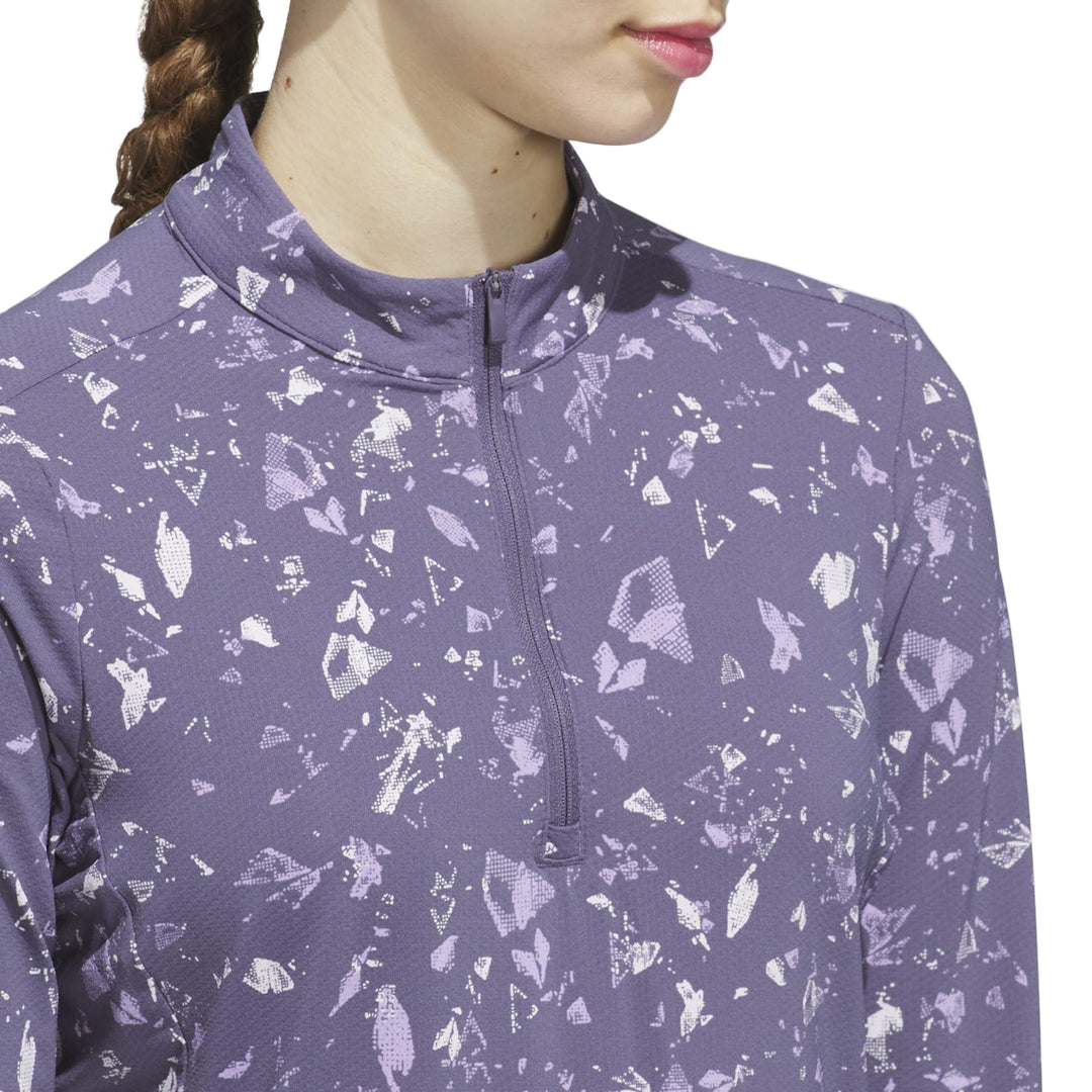 Lavender and white geometric print zip-up top with black trim, adidas model.