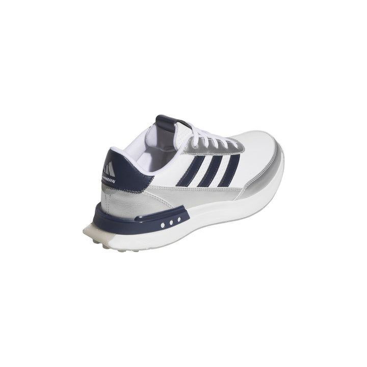 White and navy blue adidas running shoe with three stripes on the side.
