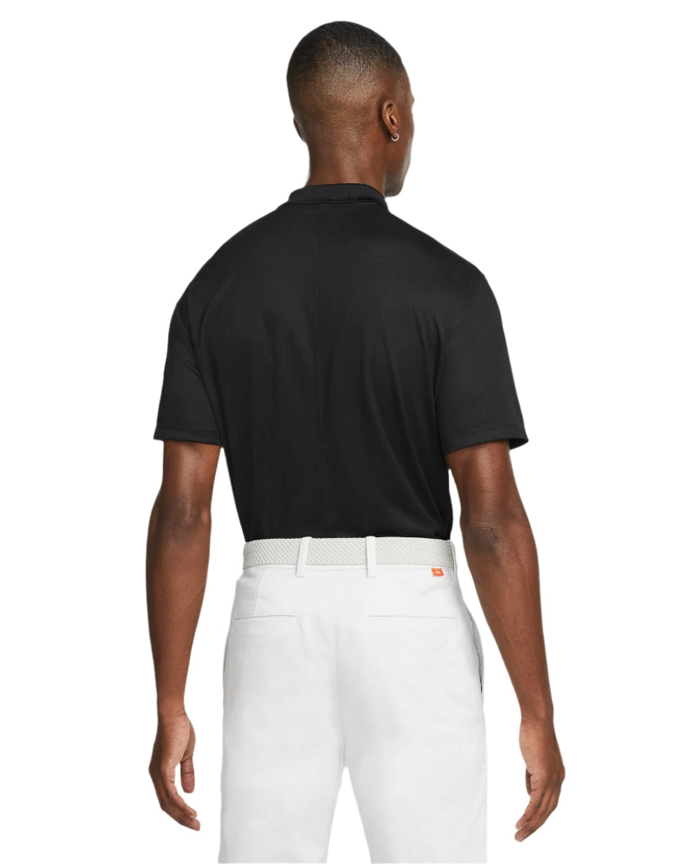 Black nike polo shirt with white pants and a small logo on the back.