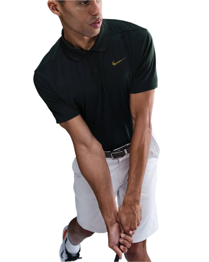 Black nike polo shirt with yellow swoosh logo, short sleeves and collared neckline.
