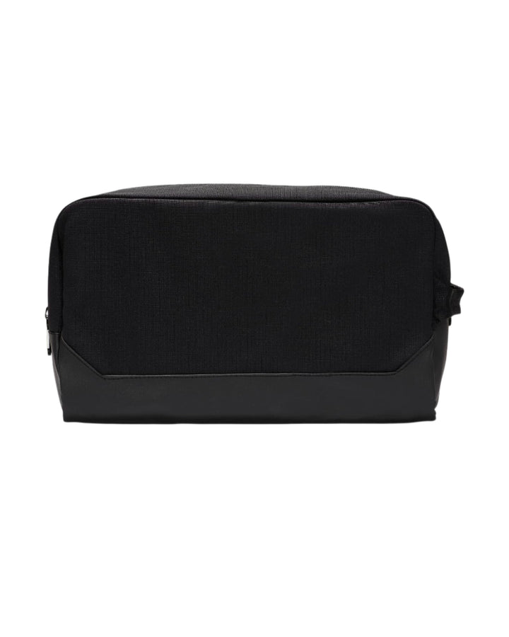 Black toiletry bag with zipper closure and textured fabric design.