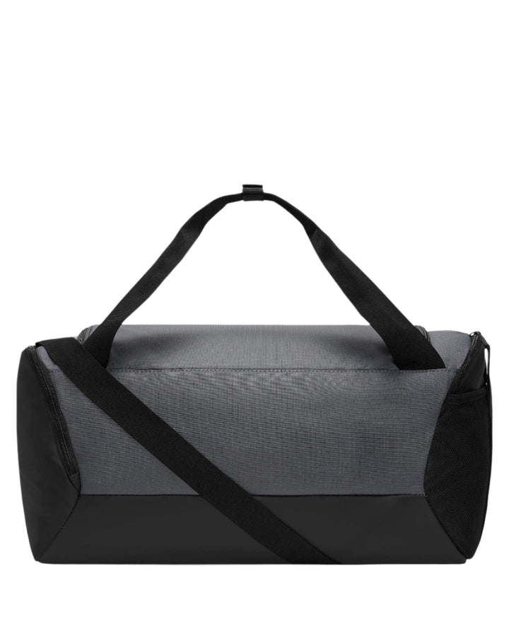 Black and gray nike duffel bag with textured fabric.
