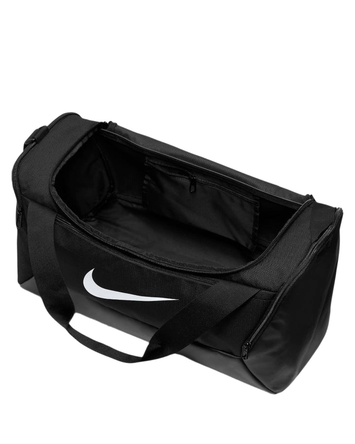 Black nike duffel bag with white swoosh logo and adjustable shoulder strap.