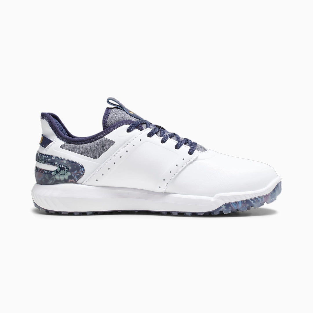 White and navy blue golf shoe with textured sole, leather upper, lace-up design.