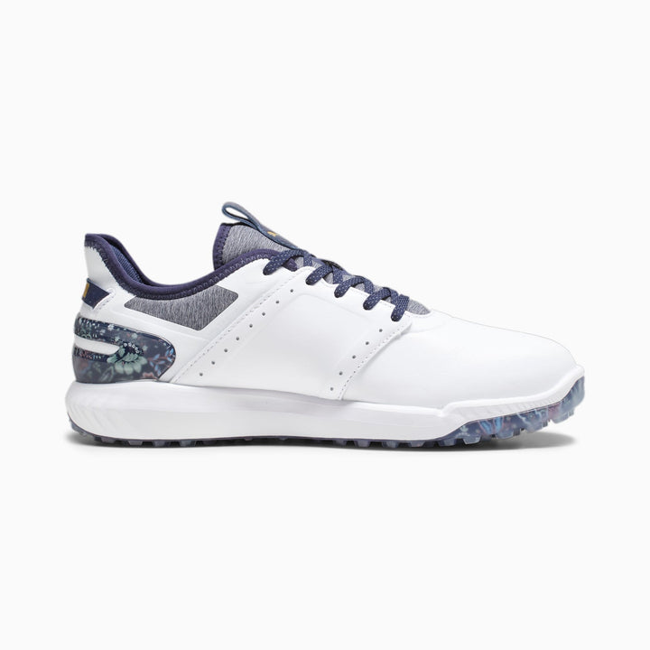 White and navy blue golf shoe with textured sole, leather upper, lace-up design.