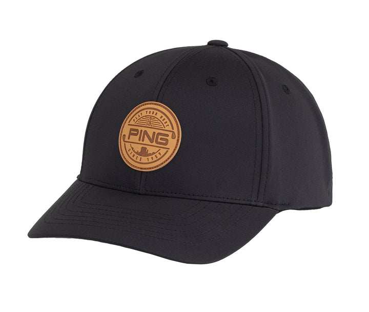 Ping black baseball cap with brown leather logo.
