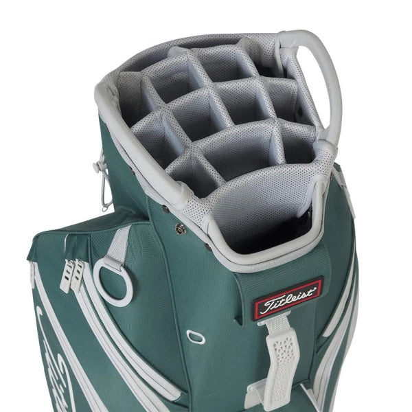 Titleist golf bag with green and white accents, featuring a structured foam insert for organization.