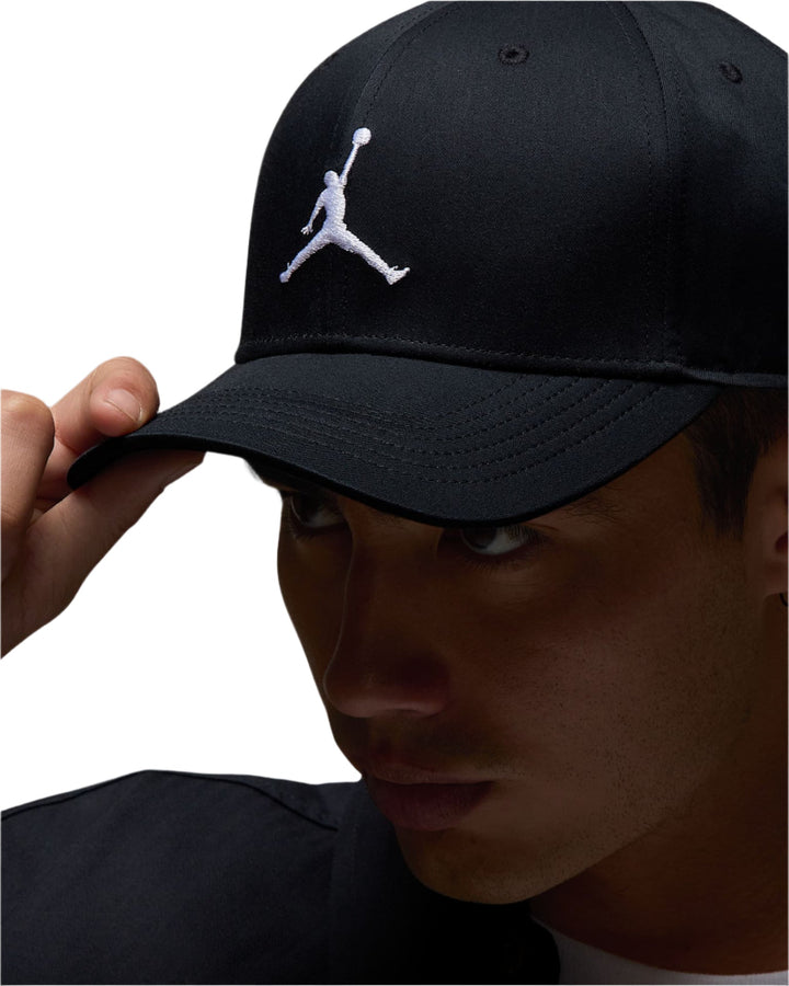 Black jordan logo cap with white jumpman design.