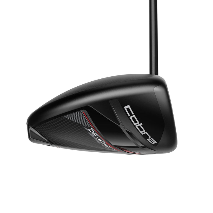 Black cobra golf driver with red accents and carbon fiber design.