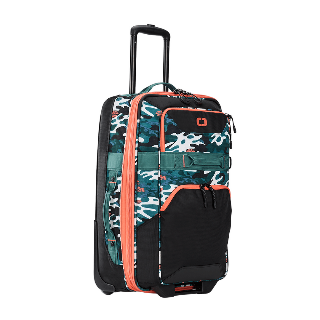20-inch ogio freewheel suitcase with teal camouflage pattern and coral accents.