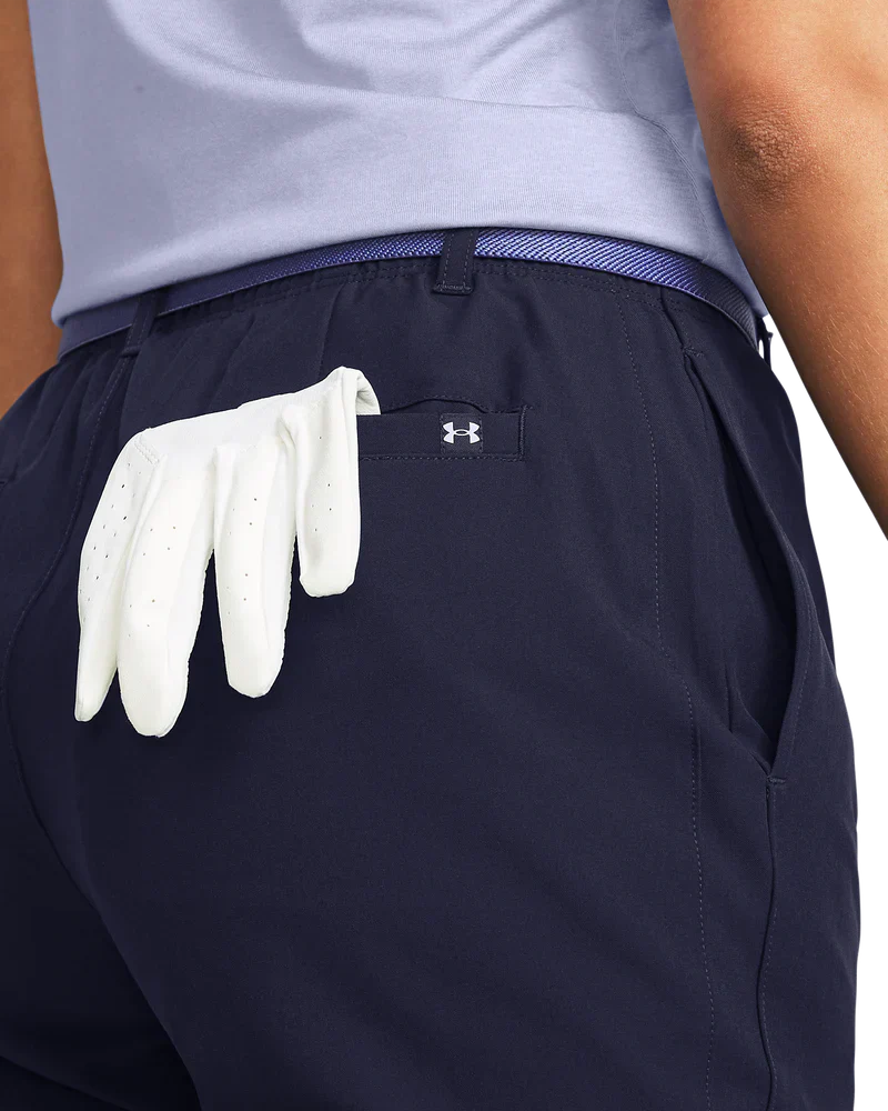 White golf glove with perforated finger tips, made of synthetic leather and mesh material.