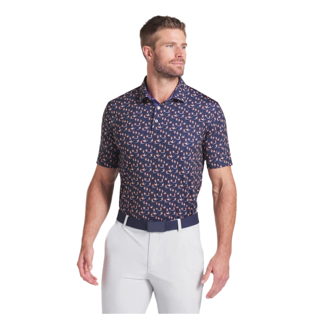 Navy blue polo shirt with white and red anchor pattern, made of cotton.