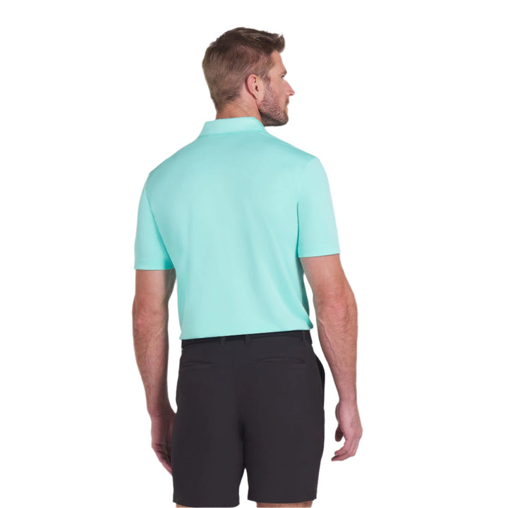 Mint green polo shirt with black shorts and a white collar, likely made of cotton or polyester blend.