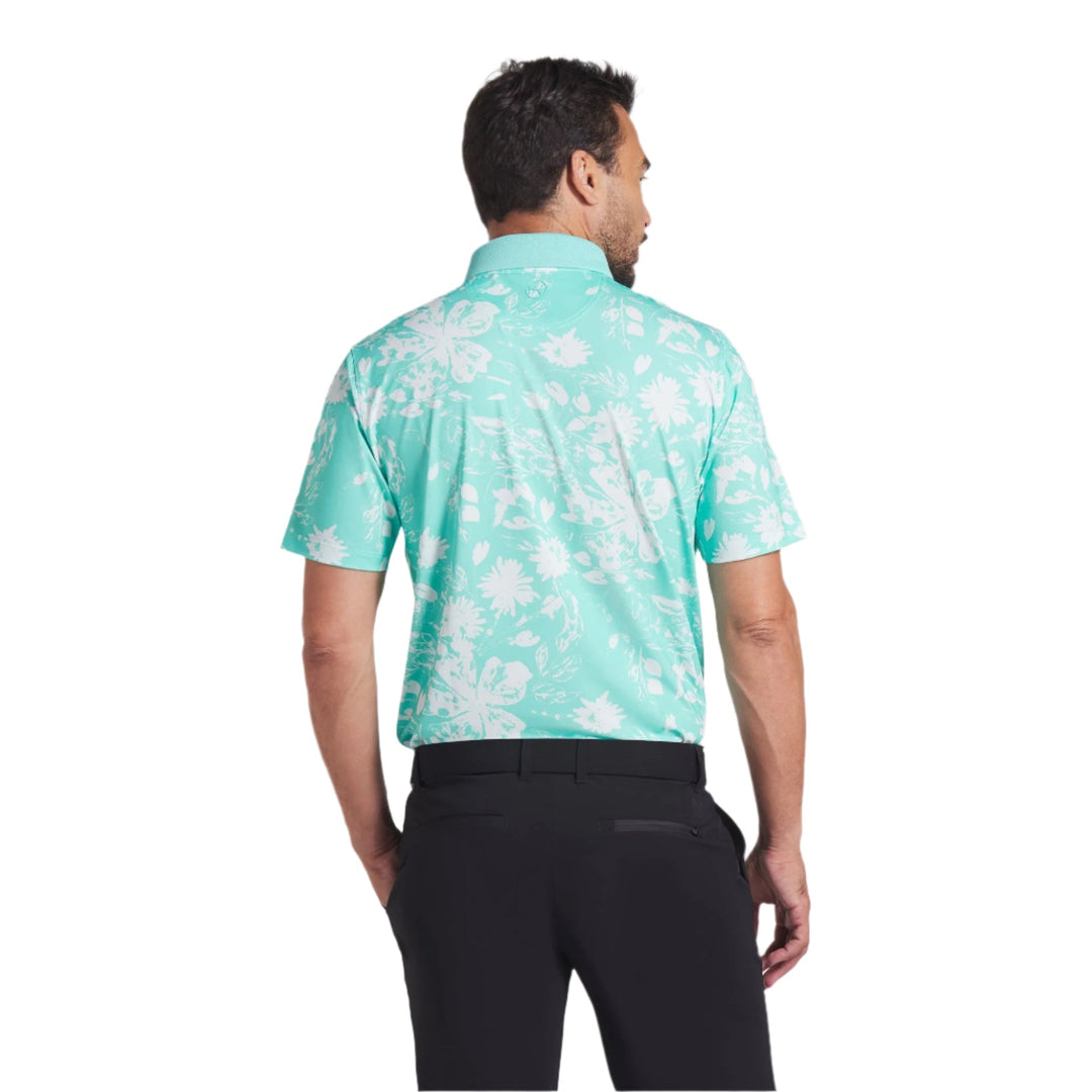 Turquoise and white floral golf polo shirt with short sleeves.